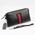 Black pebbled leather long wallet for women with classic striped webbing and wristlet - Black