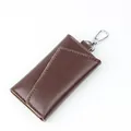 Dark brown lychee grain leather key case with metal lobster clasp and topstitching - Light Coffee