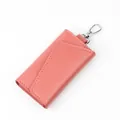 Coral pink genuine leather key pouch featuring fine texture and silver metal clasp - Watermelon red