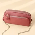 Minimalistische Crossbody-Tasche in Altrosa aus Leder mit goldener Kettenriemen - Sonnenuntergangsrot