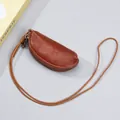 Mini portamonete in vera pelle marrone-arancio con cordino da collo e zip in metallo - Marrone dorato