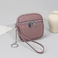 Mini portamonete in pelle rosa polvere con texture martellata e portachiavi argento - Viola Loto