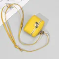 Mini yellow top grain leather coin purse with silver zipper and adjustable crossbody strap - Marigold Yellow