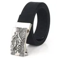Men's black nylon belt featuring a silver buckle with embossed dinosaur patterns - Antique Silver Buckle - Black