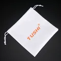 White drawstring gift bag with orange TUSHI logo and durable woven fabric texture - White Pouch