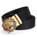 Men's black nylon tactical belt with a metallic gold 3D lion head buckle feature - Antique Copper Buckle - Black