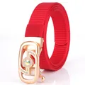 Red woven nylon belt for women featuring a gold buckle with rainbow crystal details - Rose Gold Buckle - Red
