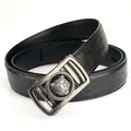 Men's black leather belt featuring an ostrich pattern and a lion head buckle - 105 / Black