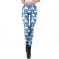 Women's blue Christmas leggings featuring white llamas in red hats and snowy patterns - Blue Base Christmas Alpaca Pattern (SKDK077)