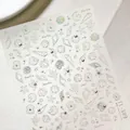 Pegatinas de uñas tema océano con patrones de estrella de mar y concha láser plateada - TL-389 Estilo de Vida Marina