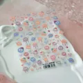 Self-adhesive 5D embossed cartoon nail stickers with colorful fur ball theme designs - Furry Ball Paradise (TS-4117)