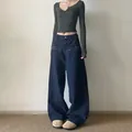Baggy dark blue trousers with silver star rivets on pockets for casual styling - Dark Blue