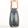 Baggy retro washed blue jeans with large cargo pockets and white letter H embroidery - S / Vintage Blue