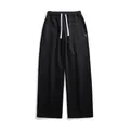 Men's loose black drawstring wide-leg sweatpants featuring a side woven label detail - S / Black