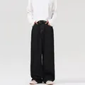 Dunkelblaue Vintage-Jeans mit weitem Bein und lockerer Passform für Herren und Damen im Retro-Stil - S / Tiefschwarz