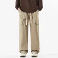 Men's loose cargo pants in khaki with drawstring waist and large side flap pockets - 3XL / Dark Khaki