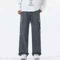 Men's dark grey waterproof cargo pants with multiple utility pockets and loose fit - Modern Gray