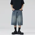 Men's loose wash blue denim shorts with vintage lightning pattern and wide leg fit - S / Vintage Blue