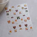 3D-Relief Nagelaufkleber mit Schleifen und Sternen in Gold, Rot und Schwarz, M-768 - M-768-Buntes Gold