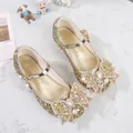 Golden glitter Mary Jane shoes for girls featuring a large rhinestone bow and pearl - EU 26 / Gold