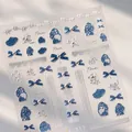 3D relief nail sticker featuring blue bows and lace patterns in denim white design - Pattern with Pearls TL-312