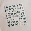 Autocollants ongles papillon steampunk M-828 avec engrenages dorés et motifs teal - Style de Papillon Steampunk Marqué à l'or (TL-330)