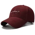 Classic burgundy cotton baseball cap featuring 3D letter embroidery and breathable holes - One Size Adjustable / Burgundy