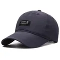 Dark blue quick-dry baseball cap with a moisture-wicking fabric and breathable vents - Standard / Navy Blue