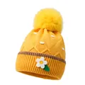 Cute yellow knit baby hat with bright pompom and 3D white daisy floral detail - One Size / Yellow
