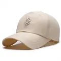 Beige quick-dry baseball cap featuring a blue and gold embroidered letter C logo - Adjustable / Khaki