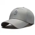 Off-white athletic baseball cap featuring embroidered letter C and quick-dry fabric - Adjustable / Light Gray