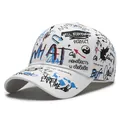White baseball cap with colorful graffiti prints and street style typography artwork - Adjustable / White Blue
