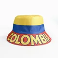 Reversible bucket hat with Colombia flag colors and bold yellow COLOMBIA text design - Colombia Yellow Blue Red Colorblock Letter Style (COLOMBIA)