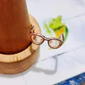 Creative rose gold glasses shaped open ring displayed on a wooden jewelry cone stand - Rose Gold Glasses Style (2)