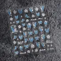 Nagelaufkleber M-668 mit blauen Schmetterlingen, weißen Blumen und Silbersternen - Blauer Schmetterling weiße Blumen (M668) / Mit Glasscherben-Effekt und Gelee-Kleber