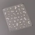 Adesivi per unghie argentati con motivi metallici di luna e stelle su fondo opaco - M-345 / Argento