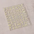 3D nail stickers featuring pale yellow bows, hearts and pearls on a transparent sheet - Light Yellow Lace Bow Style (TL-160)