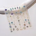 Blaue und goldene Blumen Nagelaufkleber M-611 mit eleganten Sternenmustern - Vintage Blumen Stil (M-611)
