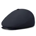 Navy blue newsboy cap with honeycomb mesh texture and classic top button design - Navy Blue