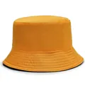 Minimalist yellow cotton bucket hat with flat top and wide brim against white background - One Size / Black Yellow