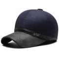 Men's dark blue winter baseball cap with ear protection and SPORT metal logo detail - Navy Blue