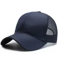 Navy blue breathable mesh baseball cap with grid texture and curved visor outdoors - Adjustable / Navy Blue