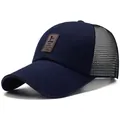 Navy blue trucker hat with breathable mesh and a brown rectangle leather patch - Adjustable / Canvas Label Navy Mesh Style (EDIKO)