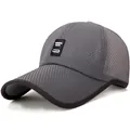 Men's dark grey mesh baseball cap featuring a black logo patch for sun protection - Adjustable / Dark Gray