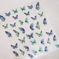 Frosted nail stickers featuring blue and green butterfly designs with gold edges DS-343 - Blue Green Gradient Laser Butterfly (M-341)