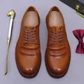 Brown leather derby shoes for men with pleated texture and artisanal Goodyear welted sole - EU 38 / Brown
