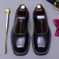 Polished burgundy square toe loafers with shoe trees, horn, and silk bow tie accessories - EU 37 / Coffee