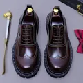Mens dark brown leather wingtip oxford shoes with brogue details and thick rubber soles - EU 37 / Coffee