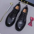 Retro black leather work boots with white contrast stitching and durable rubber soles - EU 41 / Black