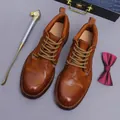 Men's vintage brown leather boots with lace-up design and contrast stitching details - EU 38 / Caramel color